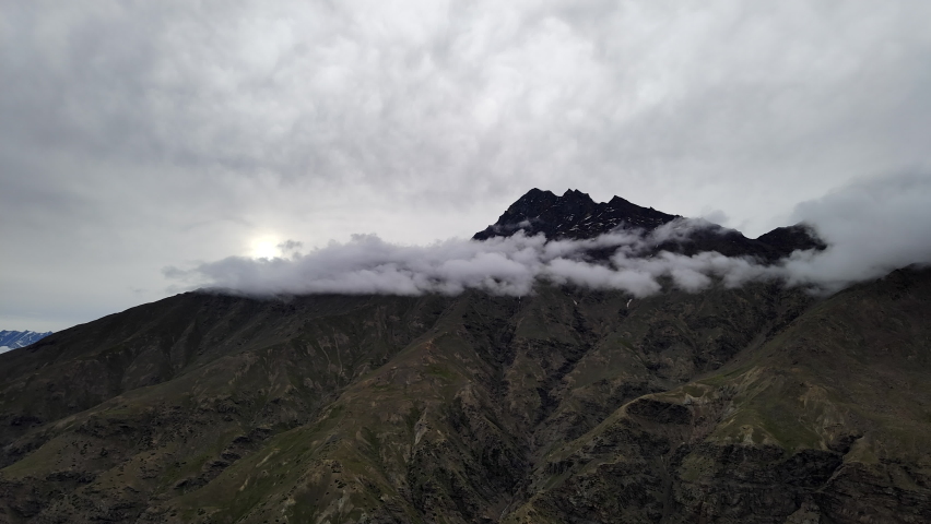 Cloud moving over mountain timelapse | Shutterstock HD Video #1094831789