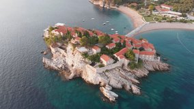 Amazing drone video of the small old town of Sveti Stefan and resort Petrovac in Montenegro.