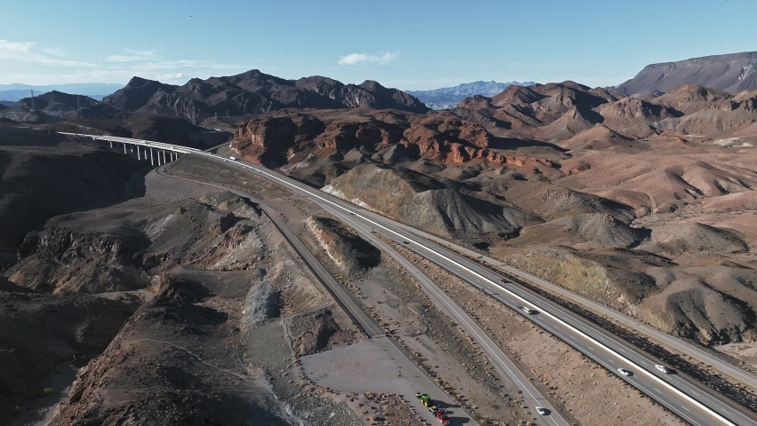 Famous sunny American desert highway road near Las Vegas on Arizona and Nevada border crossing. Beautiful desert roads and bridges.