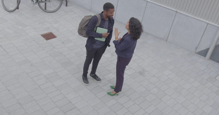 Business People Meeting Outdoors on City Street