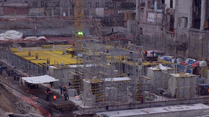 Construction site with workers at work in a district of Moscow | Shutterstock HD Video #1094843067