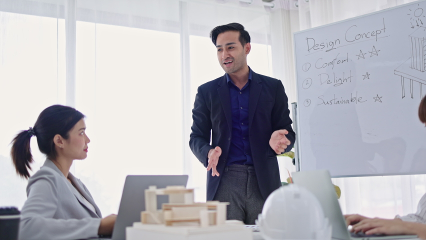 Group of Asian businessmen have a work presentation meeting. Brainstorming for the cooperation of company employees. Plan a successful marketing strategy project. | Shutterstock HD Video #1094852817