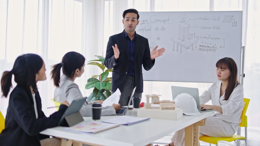 Group of Asian businessmen have a work presentation meeting. Brainstorming for the cooperation of company employees. Plan a successful marketing strategy project. | Shutterstock HD Video #1094852823