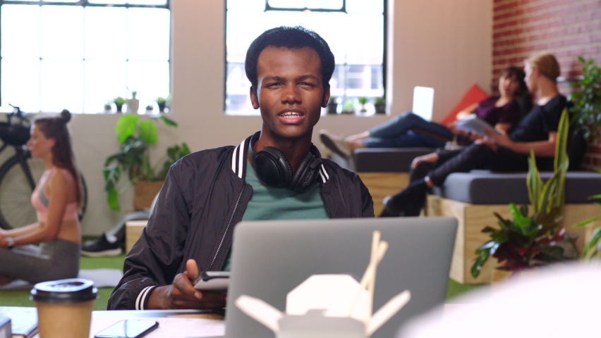 Creative, teamwork and idea with a business man and colleague working together as a team in their office on design and creativity. Creative, collaboration and technology with a male graphic designer - Powered by Shutterstock - Get 15% off with code: PIKWIZARD15