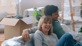 New home, celebration and happy couple moving sofa in for furniture excited of their residential real estate property. Homeowner, smile and young woman lifting a couch with her partner at their house - Powered by Shutterstock - Get 15% off with code: PIKWIZARD15