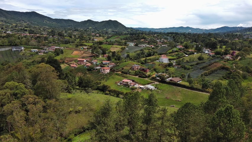 Aerial view with a drone of the countryside, where they no longer cultivate their land but now there are many constructions in El Carmen de Viboral, Antioquia, Colombia.