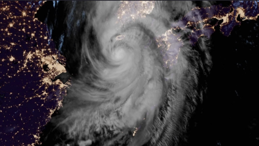 Typhoon hurricane seen on weather satellite and Doppler radar approaching land
