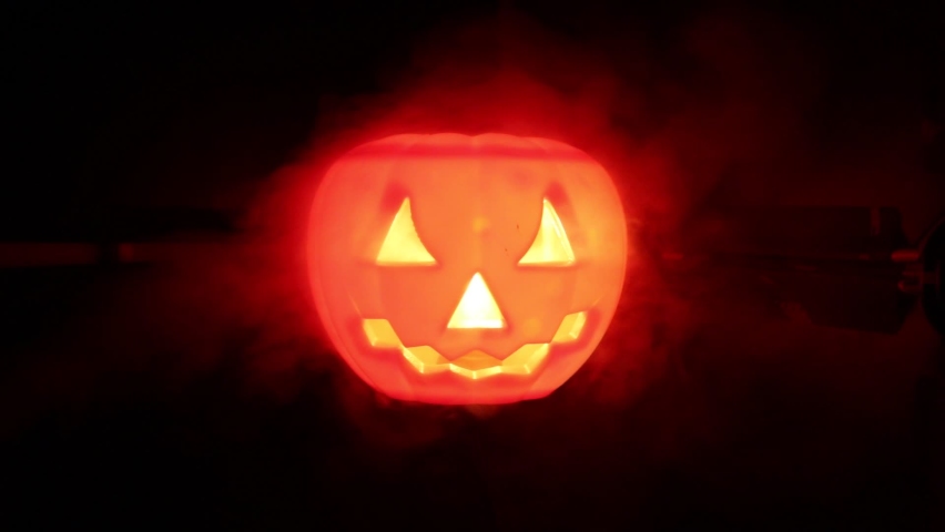 Pumpkin to celebrate Halloween on a wooden background
 | Shutterstock HD Video #1094856827