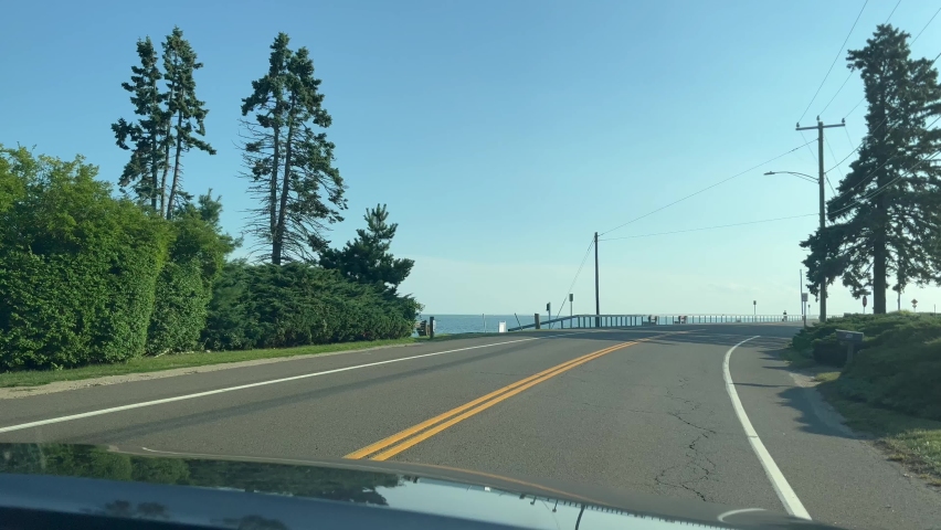 Scenic drive with ocean on the side from inside the car Royalty-Free Stock Footage #1094864655