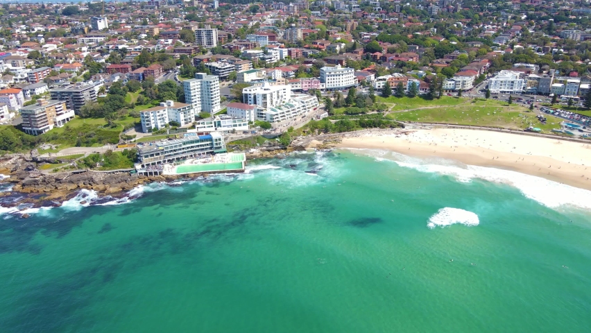 Aerial drone view of Bondi Beach pool at South Bondi Beach in Sydney, Australia on a sunny day during spring 2022   Royalty-Free Stock Footage #1094875385