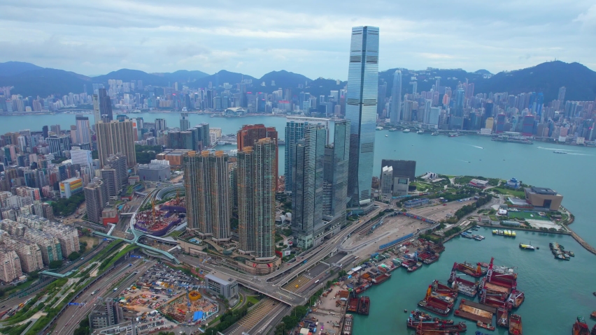 West Kowloon Cultural District, A Waterfront Leisure Promenade Palace Museum Freespace near Central, Victoria Harbour, Hong Kong in the background, Aerial drone skyview | Shutterstock HD Video #1094876789