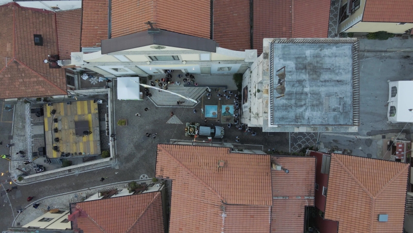 Aerial view of people in the street of Ospedaletto d