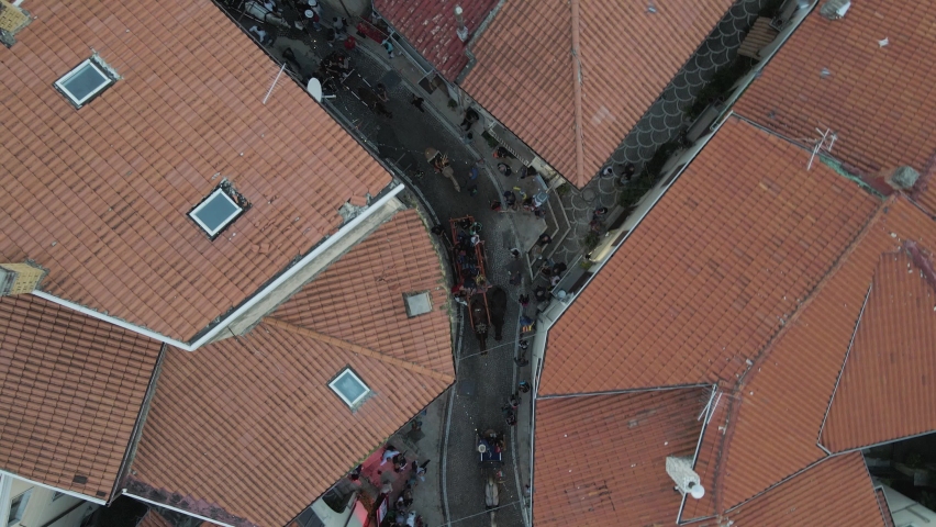 Aerial view of people in the street of Ospedaletto d