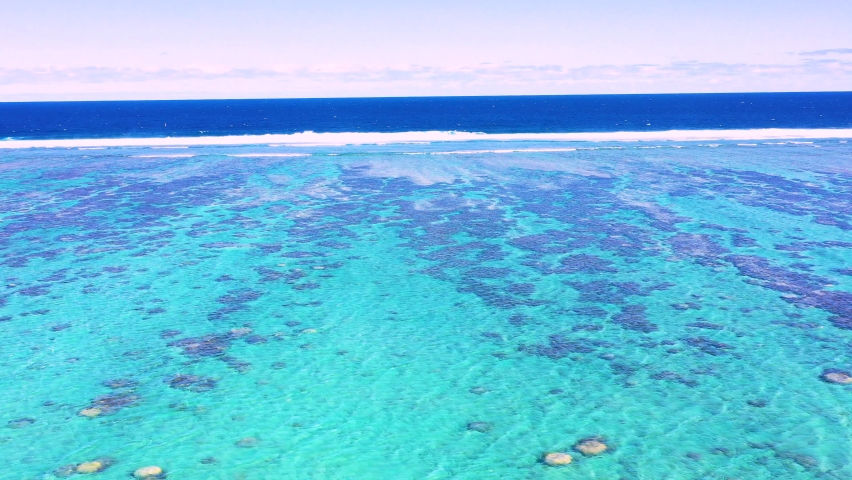 Aerial view of the coral reef snd lagoon at Plage de la Saline, Reunion Island.