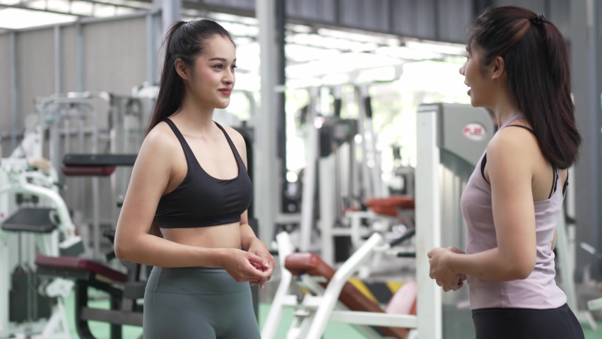 Beautiful women working out in gym together, Healthcare motivation concept | Shutterstock HD Video #1094883451