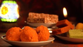 Peanut chikki candy gajak, Laddu, Indian sweet foods specially made for festivals of India like Diwali, Dussehra, Holi, ganesh chaturthi, Ram navami, Durga pooja, durga ashtami, Navratri.