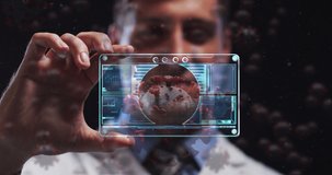 Animation of virus cells and digital interface over male doctor. global medicine, healthcare and technology during covid 19 pandemic concept digitally generated video.