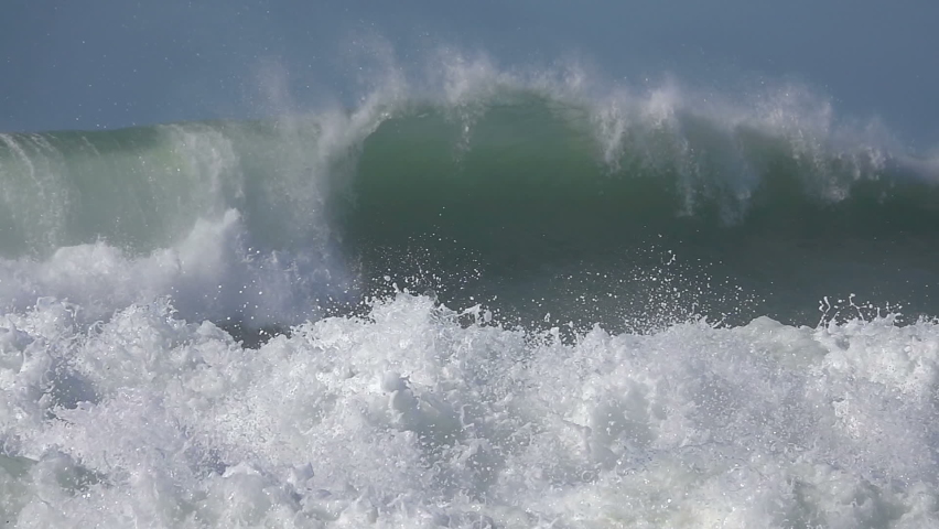 Big Wave. Stormy ocean. Stormy waves splashing foam fizz sea, blue sky.  Royalty-Free Stock Footage #1094904529