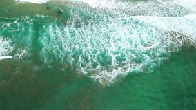 Aerial video of waves breaking on New Zealand shoreline