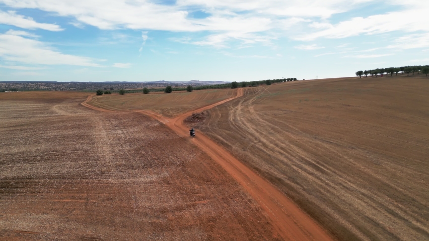 Motorcycle Drives Along Dirt Road Portugal Aerial View | Shutterstock HD Video #1094914591