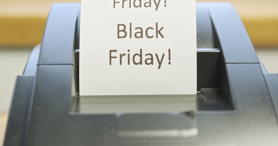 Receipt printer prints text: Black Friday. Close-up, front view. Concept of promotions, sales in stores. Tear off the check | Shutterstock HD Video #1094927081