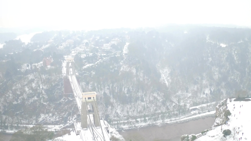 suspension bridge in the winter aerial footage in 4 k