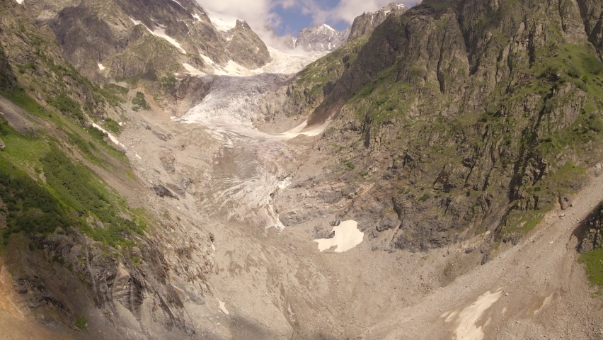 The drone flight over Chaladi glacier, Mestia, Svaneti, Georgia | Shutterstock HD Video #1094934881