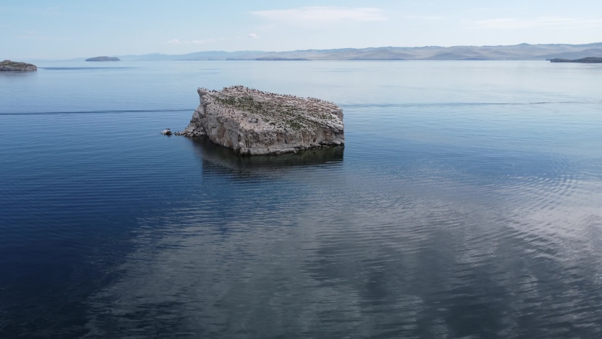 Lake Baikal is a rift lake located in southern Siberia, Russia Baikal lake summer landscape view. Drone's Eye View. | Shutterstock HD Video #1094935463