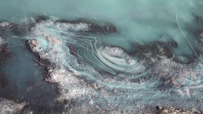 Hydrogen sulfide stagnant salt marsh. Gas turns turbid blue in water on light. All living things die in such an environment. Algae mass dying | Shutterstock HD Video #1094948777