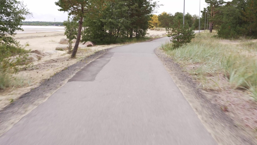 First-person view of the bike path. the bike rides along the bike path | Shutterstock HD Video #1094951609