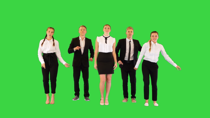 A group of happy office workers dancing on a Green Screen, Chroma Key. | Shutterstock HD Video #1094954787