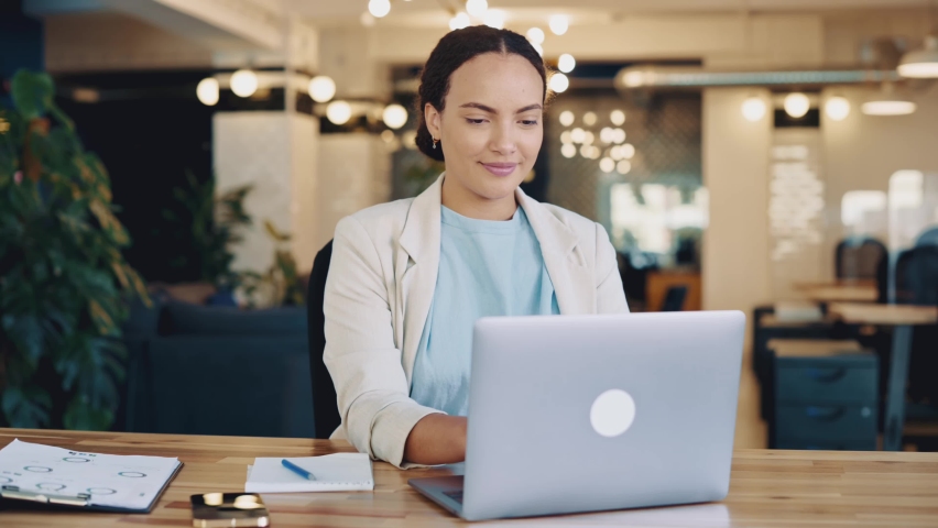 Positive calm relaxing beautiful young mixed race woman, office worker, company manager, sitting at workplace in the office, resting from work, meditating with closed eyes, smiling | Shutterstock HD Video #1094955167