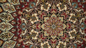 Classic patterned carpet detail video taken with a slider
