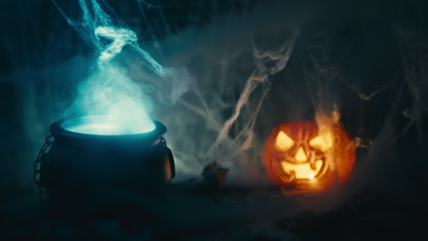 Pot with smoke coming out and Halloween pumpkin | Shutterstock HD Video #1094967133