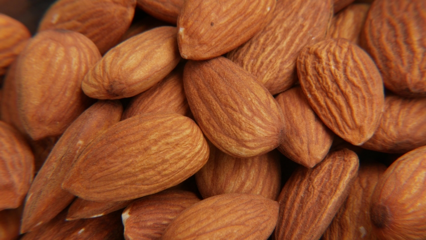 Nut almond close up. Nut rich in minerals and vitamins. badam falling down .Macro | Shutterstock HD Video #1094969925