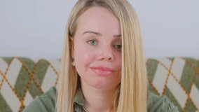 Portrait of abused young woman with prosthetic eye and facials scars. Domestic violence victim with scarred face. Download stock video clip with one eyed female person with scar on face