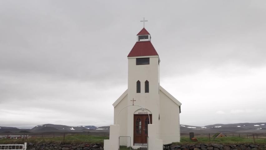 Small church in rural Iceland with gimbal video walking forward.