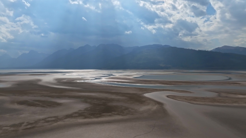 Panoramic aerial view of Grand Teton National Park peaks, landscape and Snake River on a beautiful summer day with clouds in Wyoming, USA. Magical nature in Teton.