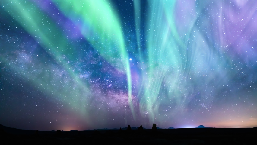 Aurora Green Purple and Milky Way Galaxy Over Iceberg Loop 35mm Royalty-Free Stock Footage #1094998651