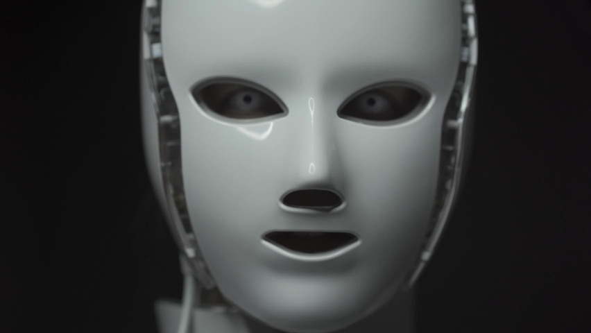 Artificial intelligence. Futuristic humanoid robot is activated, moves its head and blinking eyes. Video 4K. | Shutterstock HD Video #1094999943