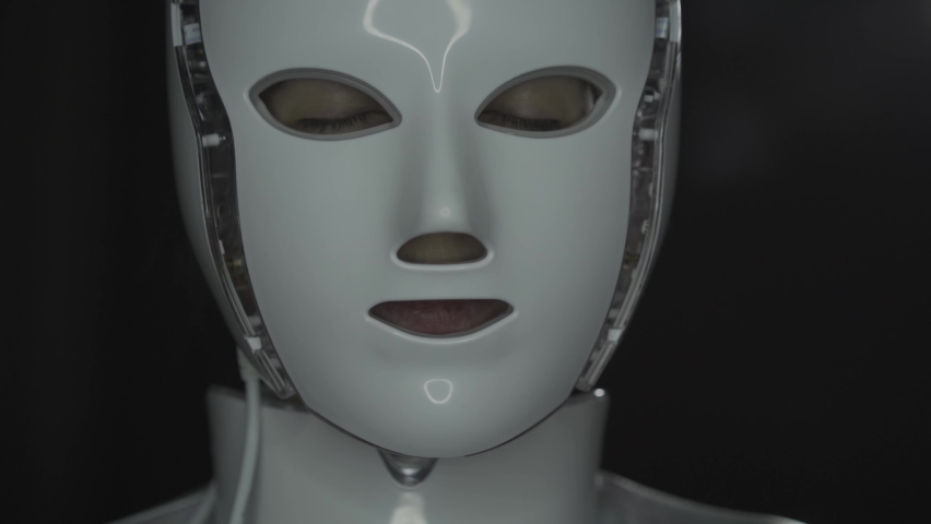 Artificial intelligence. Futuristic humanoid robot is activated, moves its head and blinking eyes. Video 4K. | Shutterstock HD Video #1094999945