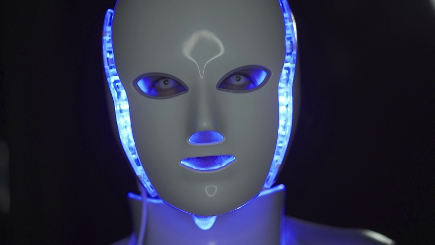 Artificial intelligence. Futuristic humanoid robot is activated, moves its head and blinking eyes. Video 4K. | Shutterstock HD Video #1094999947