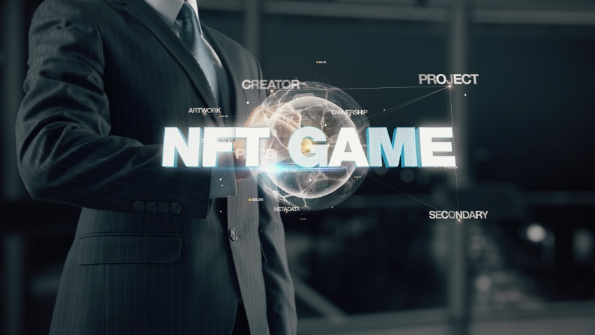 Businessman with NFT Game hologram concept Royalty-Free Stock Footage #1095007577