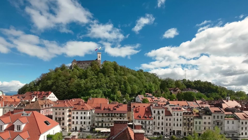 Time-lapse of Castle in Ljubljana with rushing beautiful white clouds, Ljubljana, Slovenia Royalty-Free Stock Footage #1095017331
