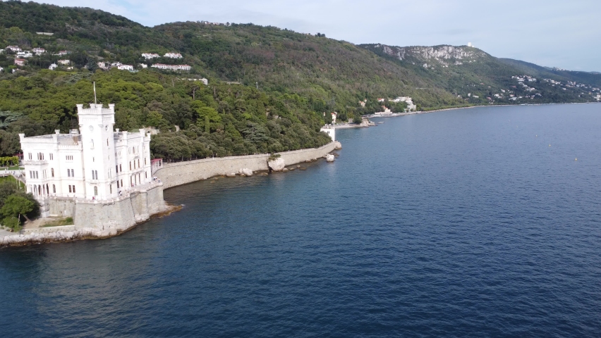 Scenic aerial footage of Miramare Castle, Italy. Fascinating aerial views of castle, park, forest and coastline.