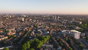 Establishing Aerial View Shot of London UK, United Kingdom, Putney, Fulham, Hammersmith, Baron's Court, Kensington, Earl's Court, hundrets of victorian homes, push in