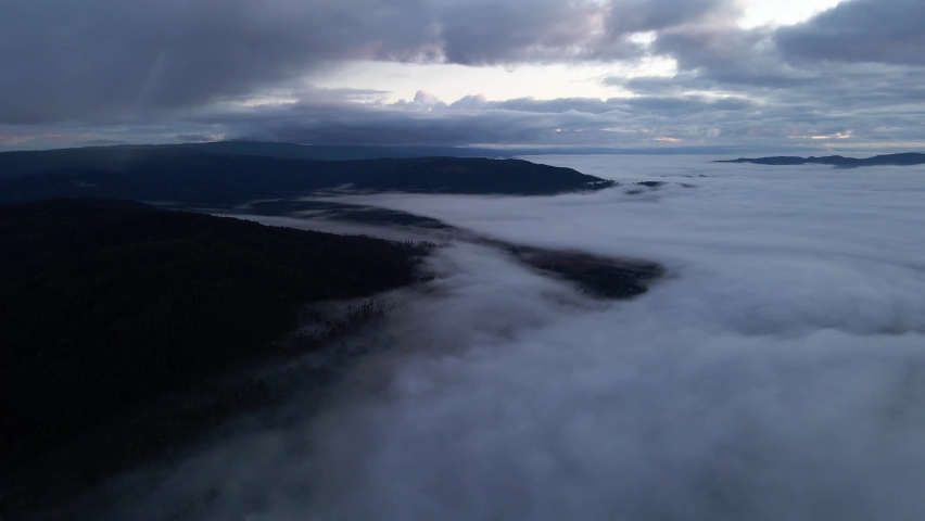Slow decent above the clouds in Chile