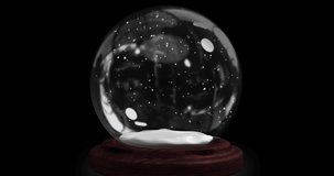 Animation of falling gold snowflakes with christmas tree in snow globe and black background. Christmas, winter, festivity, tradition and celebration concept digitally generated video.