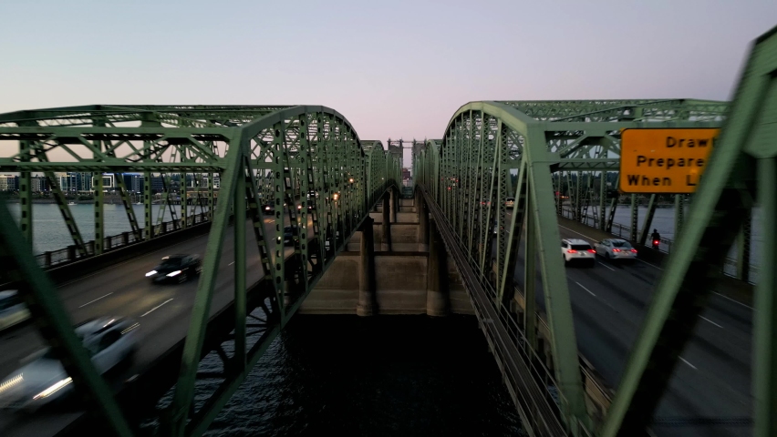 Drone footage of Oregon - Washington Interstate Bridge In Portland and Vancouver over the Columbia River water way Royalty-Free Stock Footage #1095082075