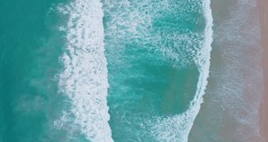 Aerial view video Beautiful blue ocean sea in sunset Aerial view Top-view over seascape water texture Nature sea wave texture background concept. Seascape in Phuket Thailand 